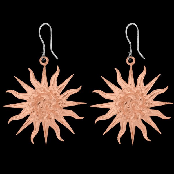 The bright and beautiful Orange Blossom Earrings are the perfect summertime western accessory.  Featuring a gorgeous sunburst shape in a hand engraved copper base.